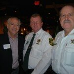 Pompano Beach Commissioner Barry Dockswell with Capt. R.W. Adkins and Lt. Rafael Lopez.