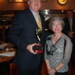 Mr. Bob Scharmann, President/CEO of John Knox Village accepts the award.